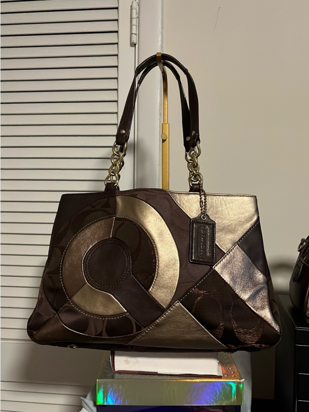 Coach Inlaid Patchwork Leather Chain Tote Bag (Model F20013) in brown and gold.